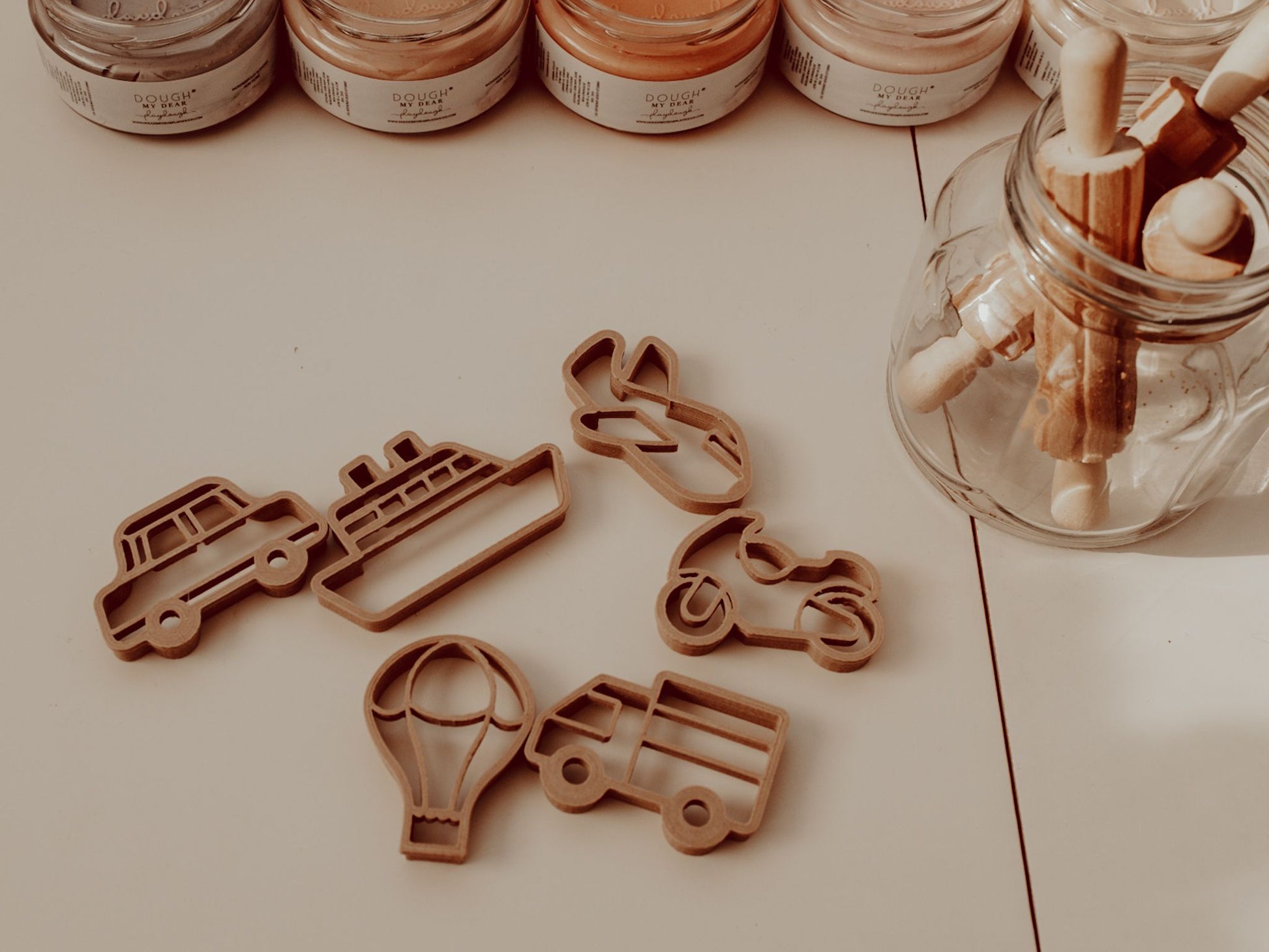 Kinfolk Pantry eco playdough cutters - a set of 6 transport themed biodegradable cutters for kids arts and crafts. Shapes include a boat, plane, car, hot air balloon, motorbike and truck.