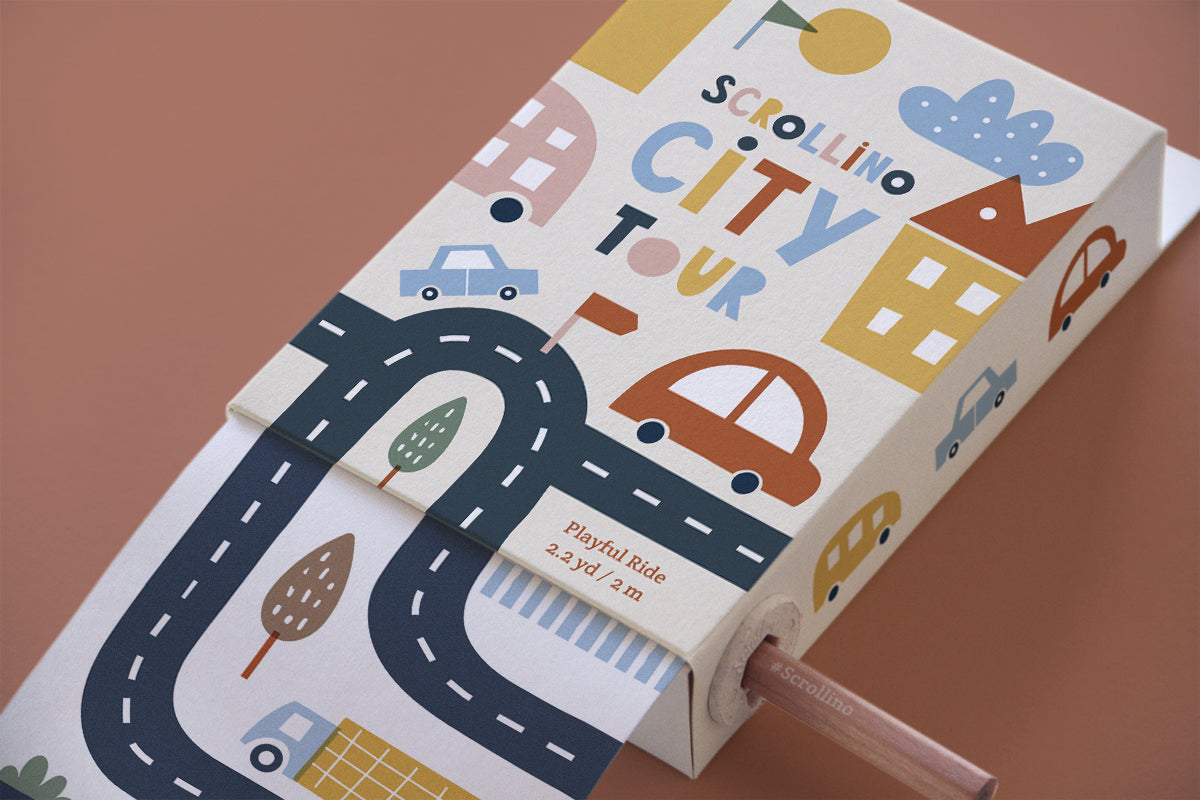 Scrollino City Tour, kids activity kit. Pull the tab to reveal 2 metres of city maps for little ones to explore with cutout vehicles to play with too.