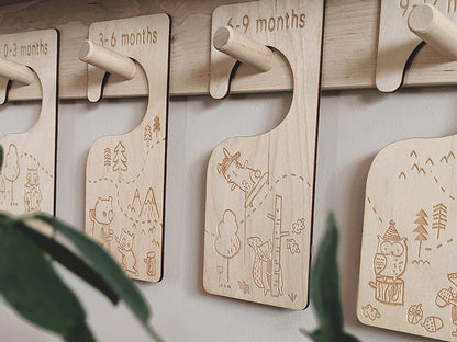 Paper & Bean clothing dividers to organise baby clothes. The design on each one is a woodland trail from newborn to first birthday. When each hanger sits next to one another the trail design follows on through the forest but individually they make beautiful designs too.